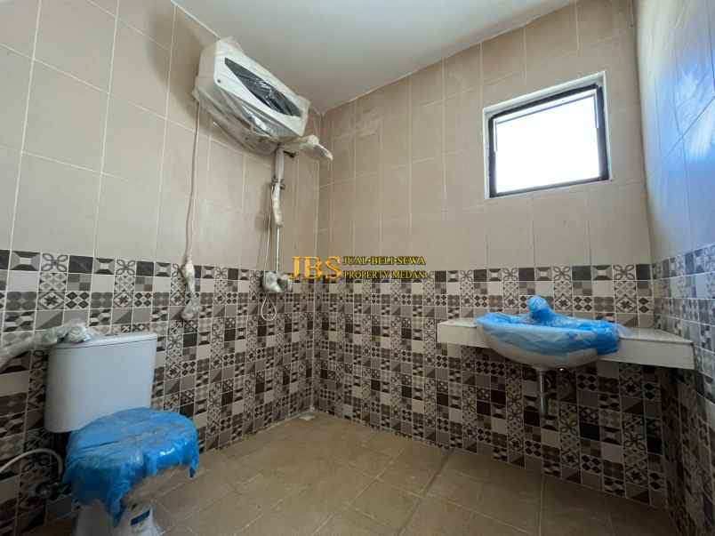 dijual rumah komplek medan resort city