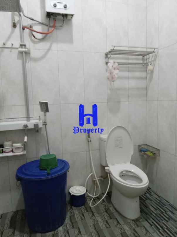 dijual rumah komplek tuasan garden