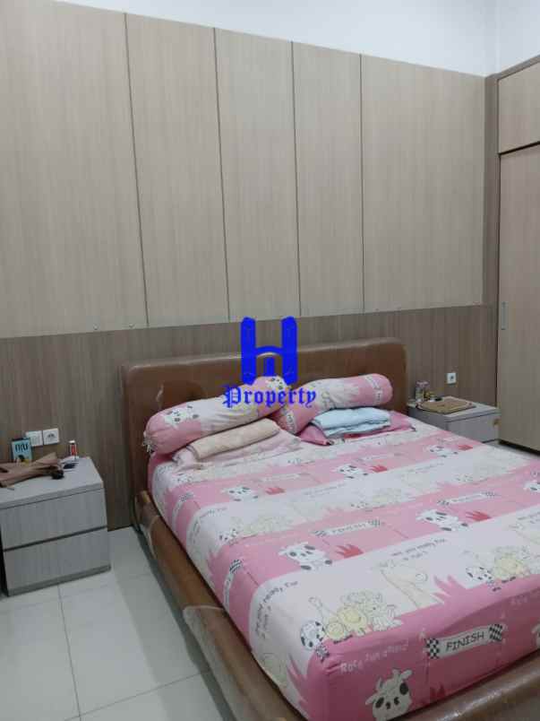 dijual rumah komplek tuasan garden