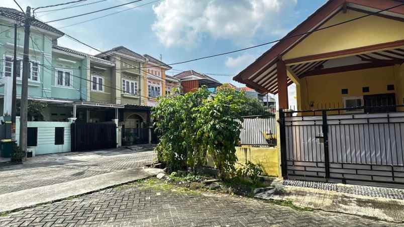 dijual rumah taman harapan baru