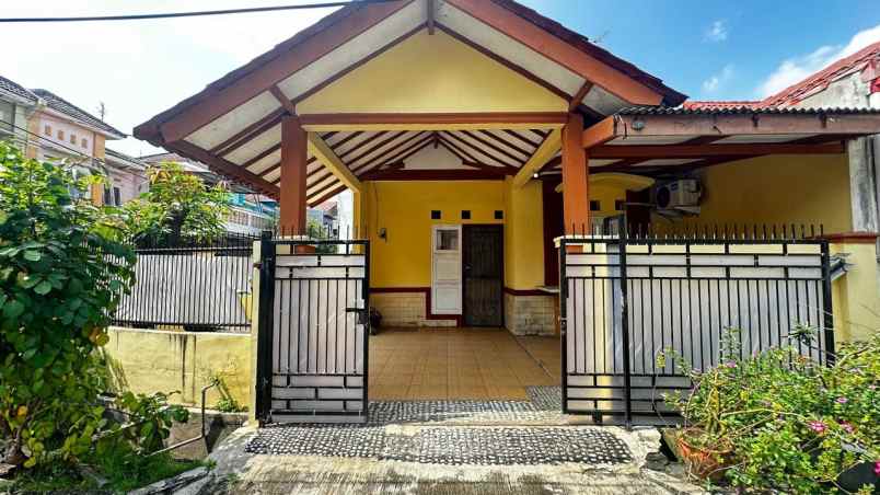 dijual rumah taman harapan baru