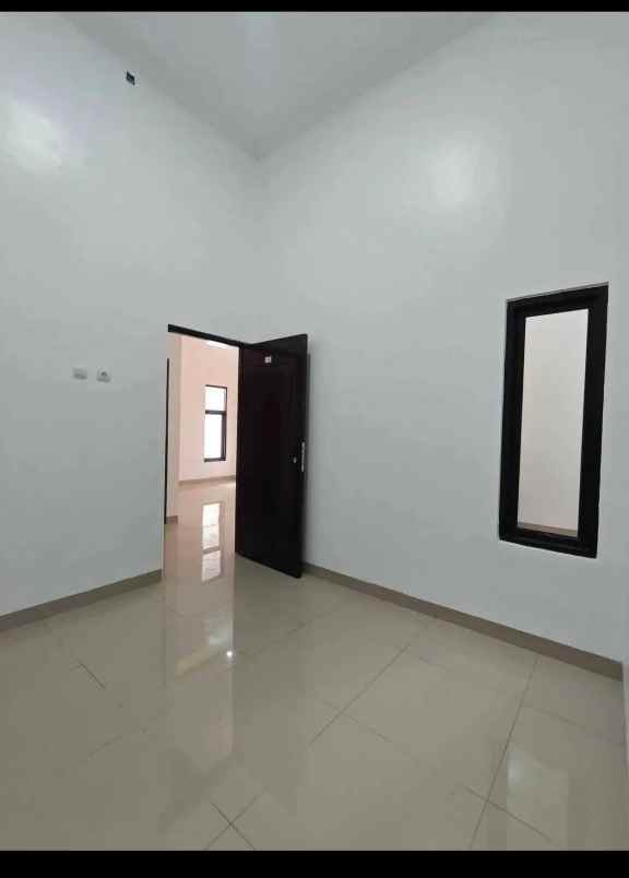 dijual rumah taman harapan baru kota