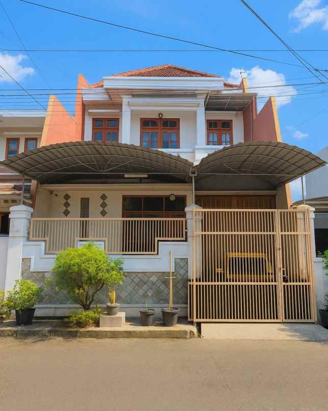 dijual rumah wisma permai barat