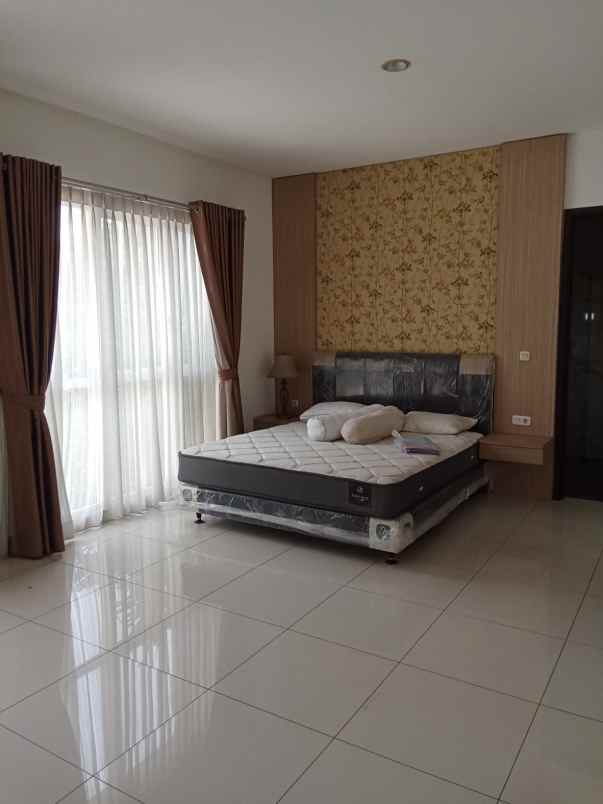 disewakan rumah cluster palm spring