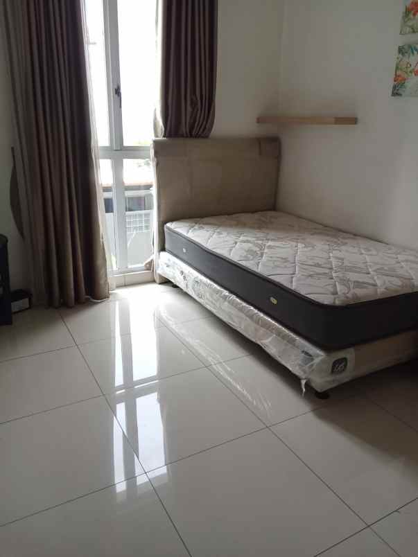 disewakan rumah cluster palm spring