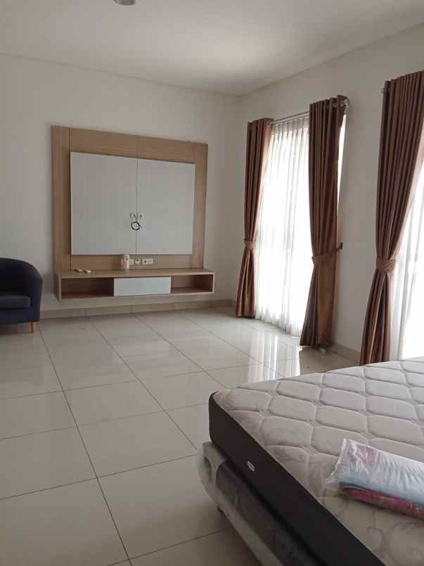 disewakan rumah cluster palm spring