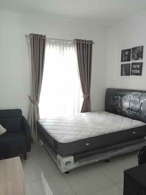 disewakan rumah cluster palm spring