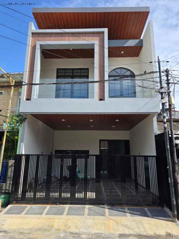 rumah babatan pantai new minimalis strategis