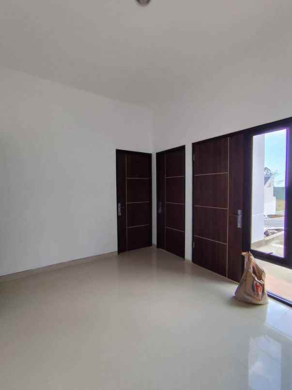 rumah konsep villa 300 jutaan dekat bns