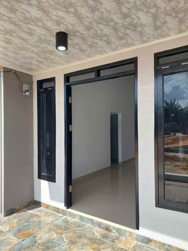 rumah nyaman asri di jalan purwodadi pekanbaru