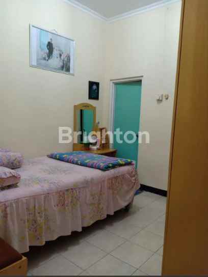 rumah pantai mentari terawat siap huni