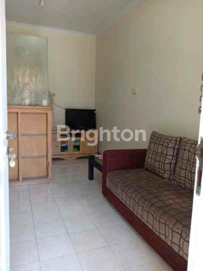 rumah pantai mentari terawat siap huni