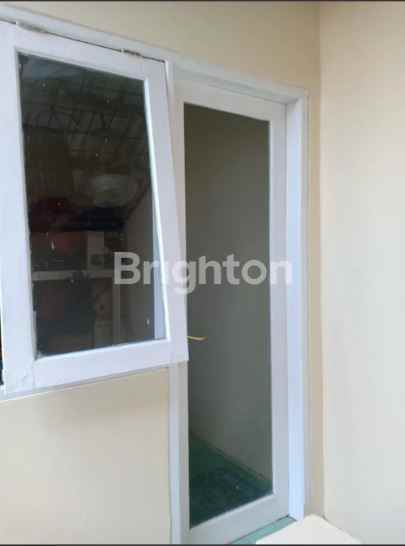 rumah pantai mentari terawat siap huni