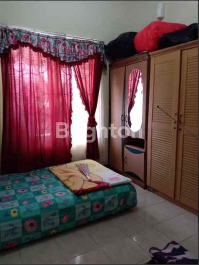 rumah pantai mentari terawat siap huni