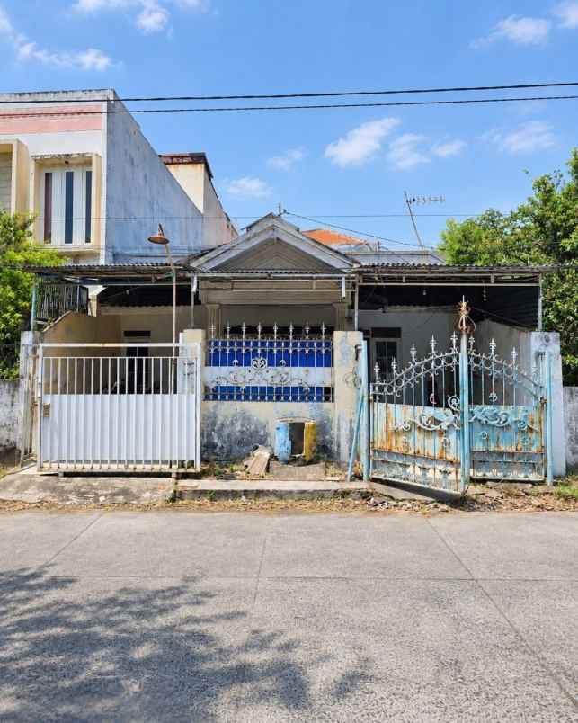 rumah wisma permai tengah strategis