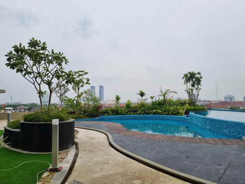 dijual apartemen grand dharmahusada lagoon