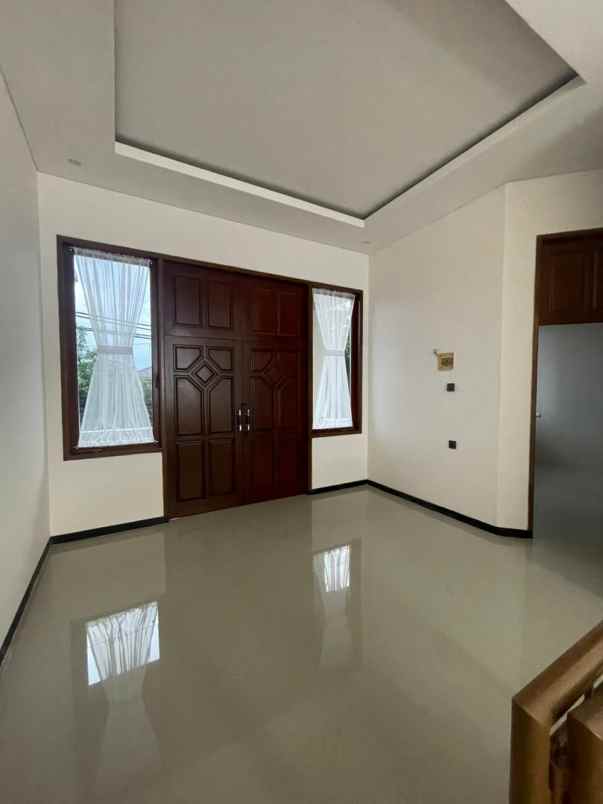 dijual rumah dharmahusada permai