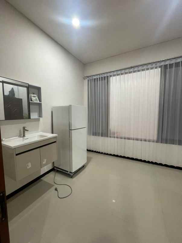 dijual rumah dharmahusada permai