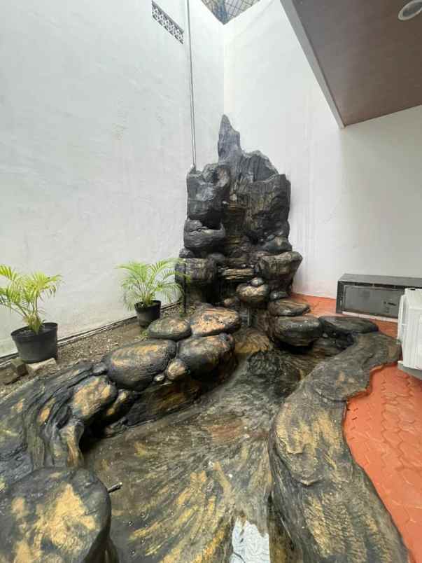 dijual rumah dharmahusada permai