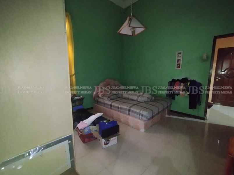 dijual rumah jalan bunga tanjung xi