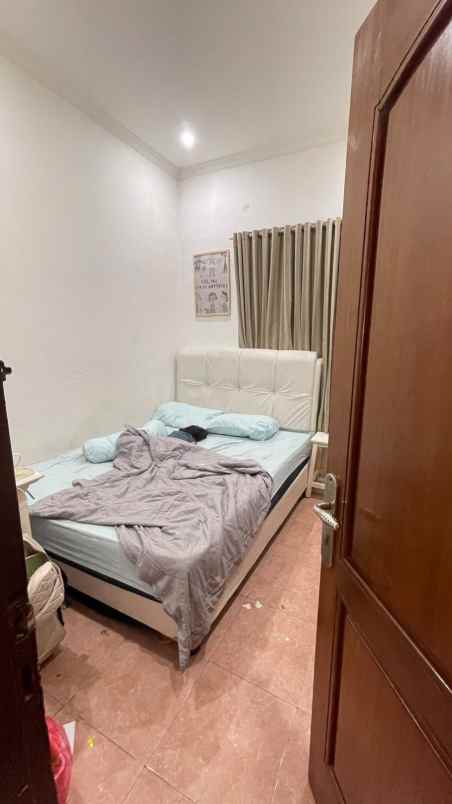 dijual rumah jl raya sukatani