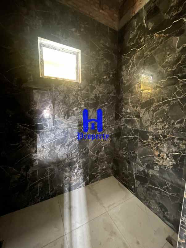 dijual rumah komplek the exclusive