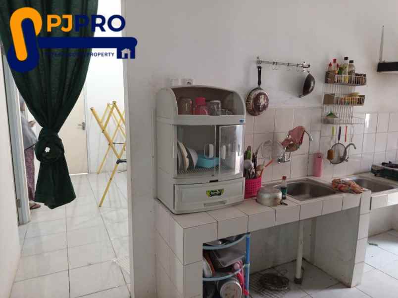 dijual rumah mungil 2unit gandeng di daerah buni bakti