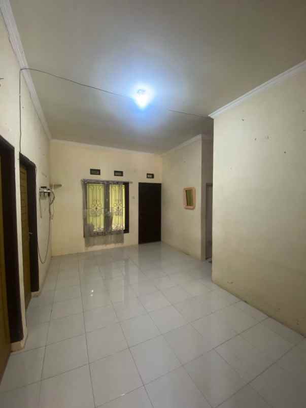 dijual rumah perum kota permata