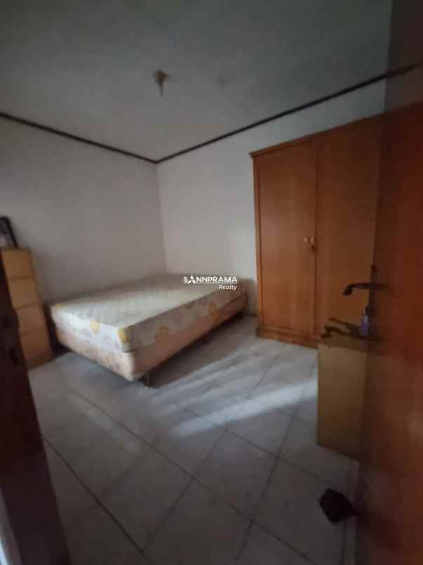 dijual rumah perumnas beji