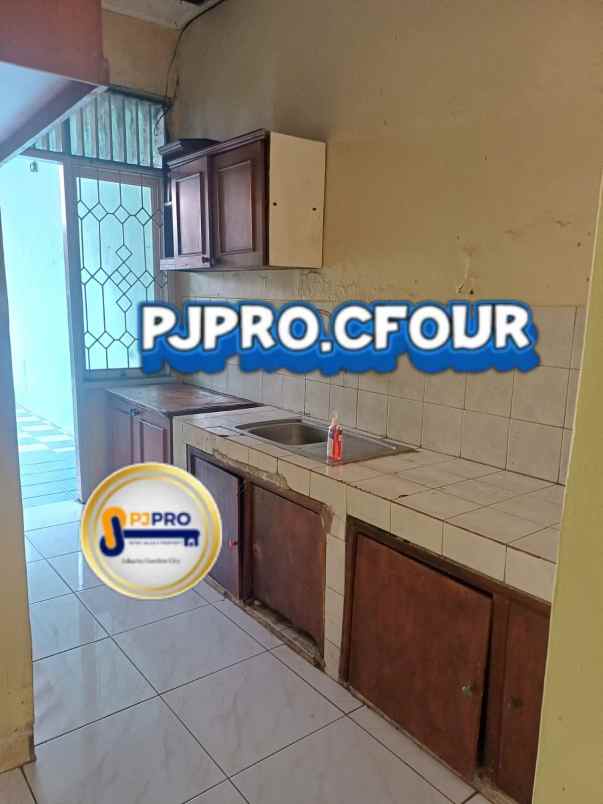dijual rumah taman harapan baru