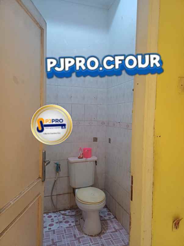 dijual rumah taman harapan baru
