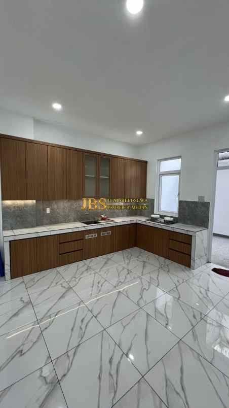 dijual villa komplek graha metropolitan