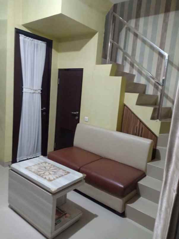 disewakan rumah pantai mentari