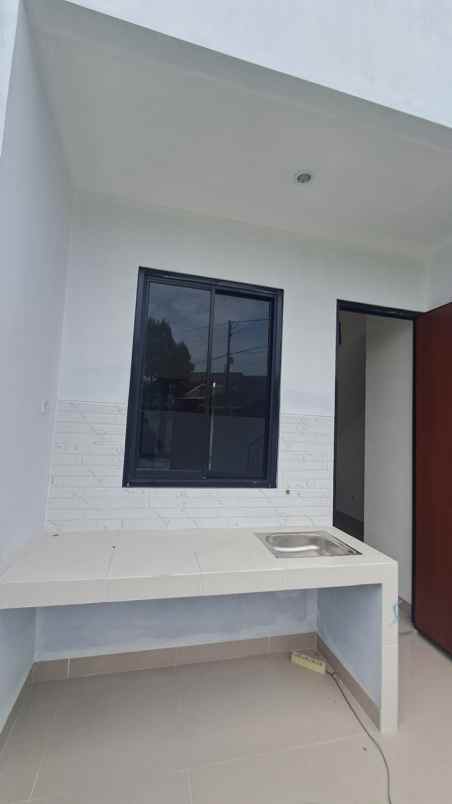 rumah 2 lantai siap huni untuk keluarga muda