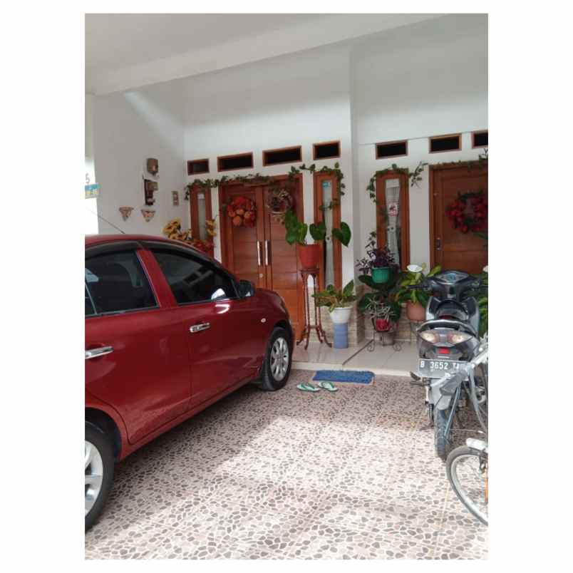 rumah grand sawangan regensi