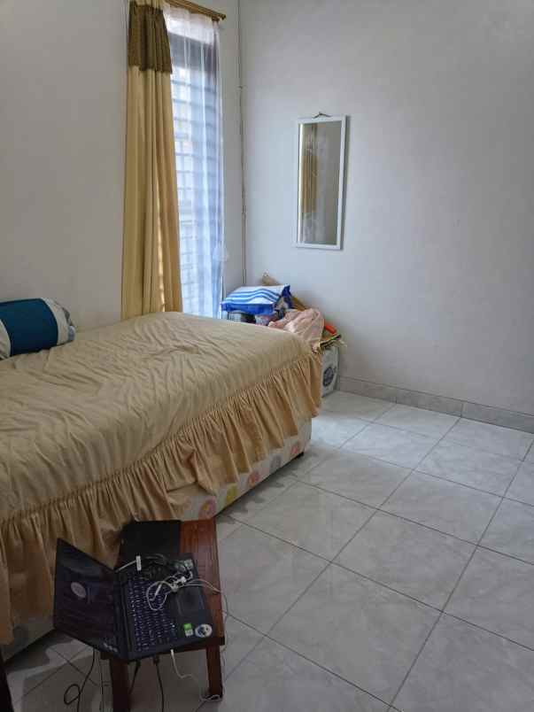 rumah kontrakan full furnished 4 kamar tidur