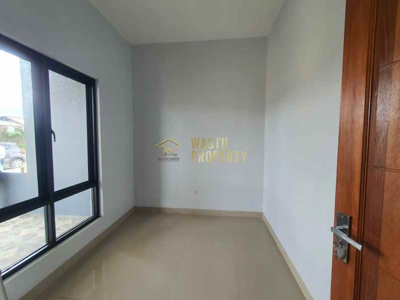 rumah minimalis dengan lingkungan aman dan nyaman