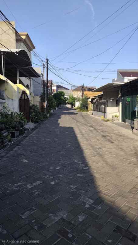 rumah sutorejo tengah strategis row jalan 2 mobil