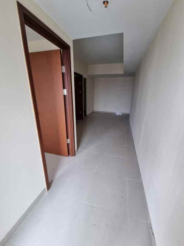 dijual apartemen grand dharmahusada lagoon