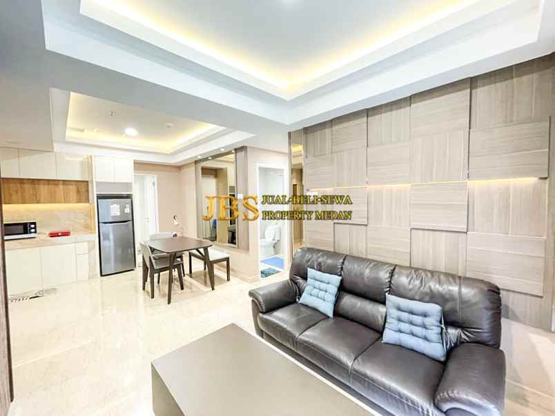 dijual apartemen podomoro city deli tower