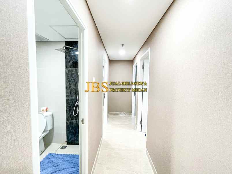 dijual apartemen podomoro city deli tower