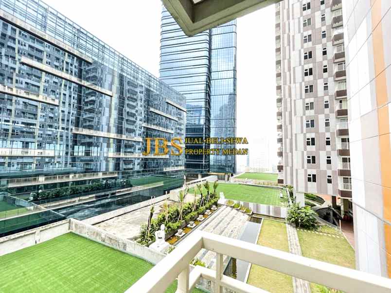dijual apartemen podomoro city deli tower