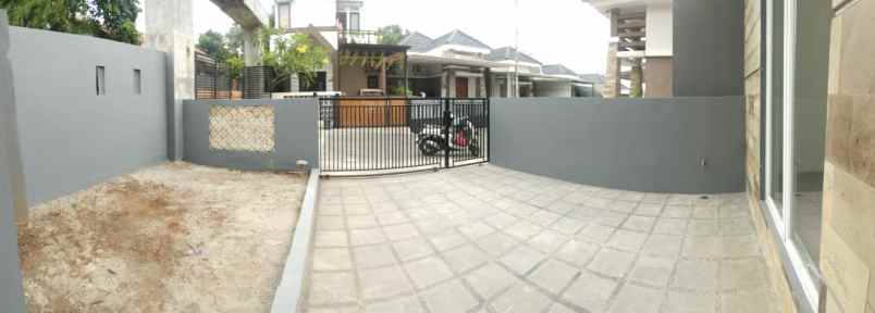 dijual rumah cluster serua indah