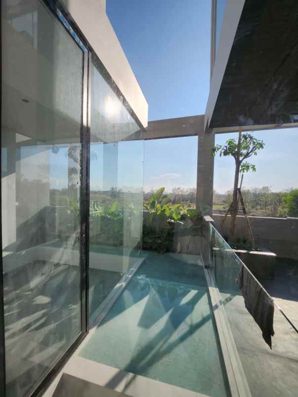 dijual rumah jalan waterfront