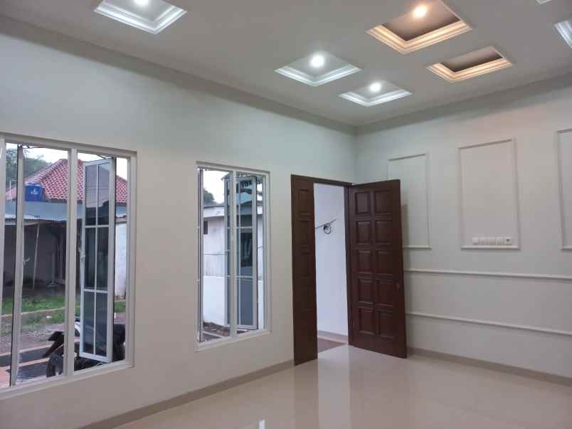 dijual rumah jln raya kalimulya