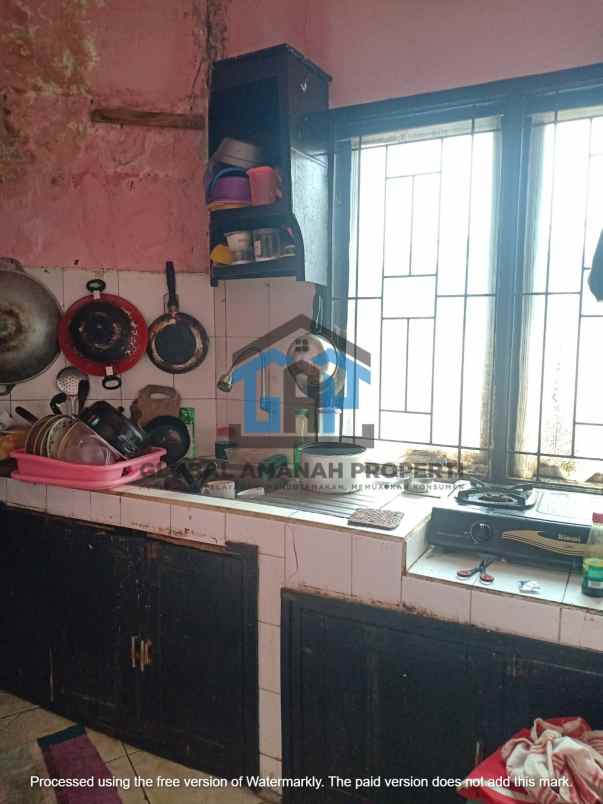 dijual rumah komplek sariwangi
