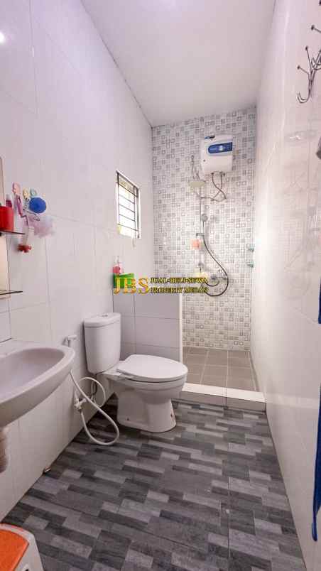 dijual rumah komplek sunggal center