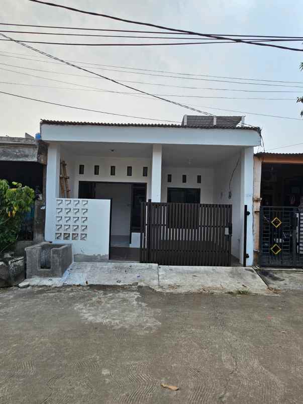 dijual rumah papan mas 1 tambun selatan