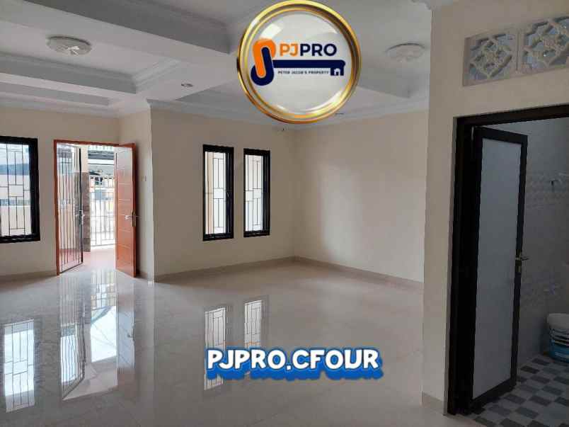 dijual rumah taman harapan baru