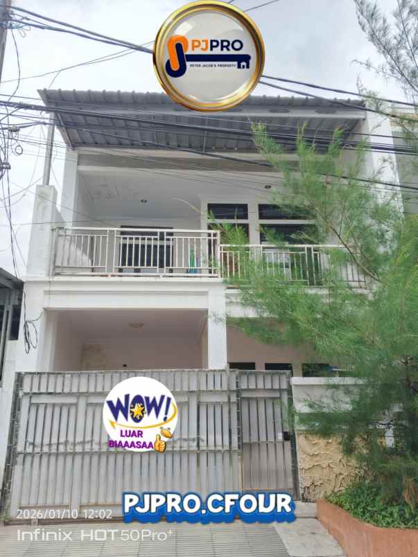 dijual rumah taman harapan baru